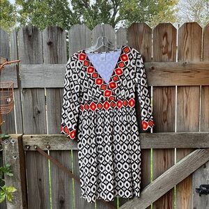 Geometric Patterned Dress with Red Accents